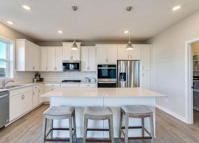 Property at 13161 Bauer Dr N, Champlin, MN 55316, 4 beds, 3 baths