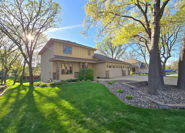 Property at 12240 Ilex St NW, Coon Rapids, MN 55448, 4 beds, 4 baths