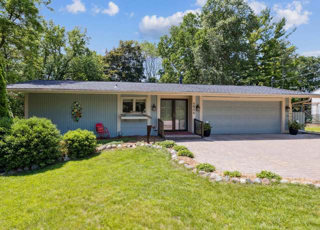Property at 4844 Woodland Rd, Minnetonka, MN 55345, 5 beds, 3 baths