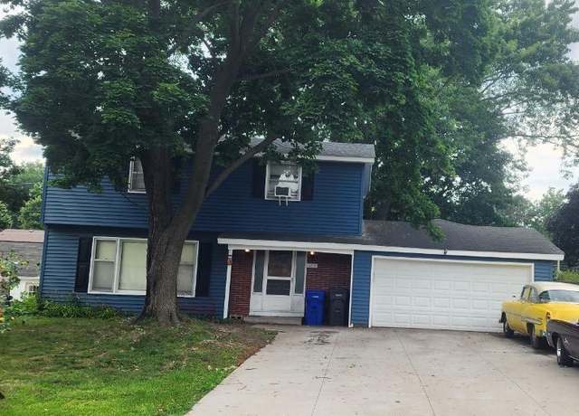 Property at 125 Battle Creek Pl, Saint Paul, MN 55119, 4 beds, 2 baths