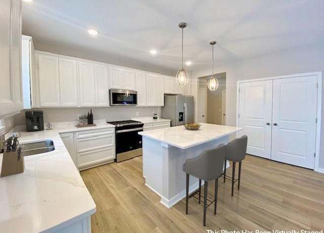 Property at 10645 Ithaca Ln N, Maple Grove, MN 55369, 4 beds, 3 baths