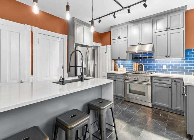 Property at 737 5th St E, Saint Paul, MN 55106, 4 beds, 2 baths