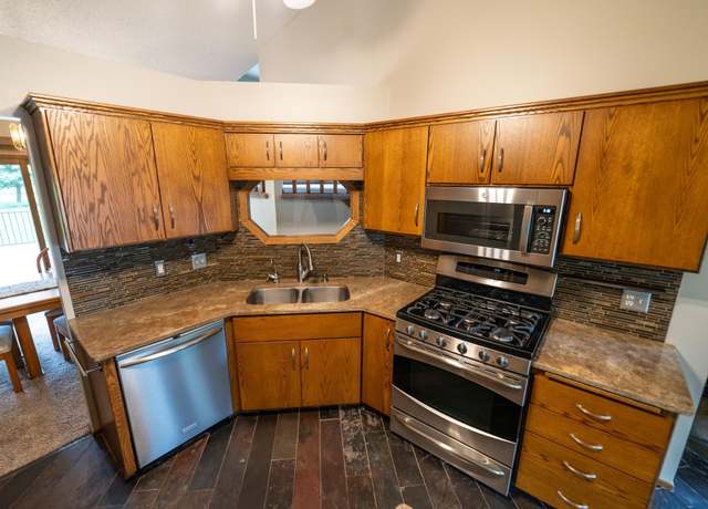Property at 12405 52nd Ave N, Plymouth, MN 55442, 3 beds, 3 baths