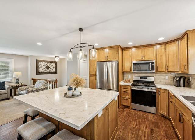 Property at 10309 Parkview Ln, Champlin, MN 55316, 4 beds, 2 baths