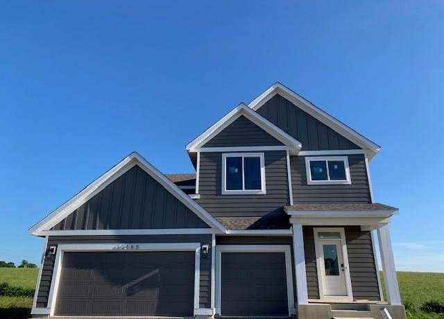 Property at 10465 Blackmoor Rd, Woodbury, MN 55129, 4 beds, 3 baths