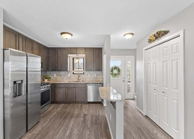 Property at 1239 Hillwind Rd NE, Fridley, MN 55432, 2 beds, 2 baths