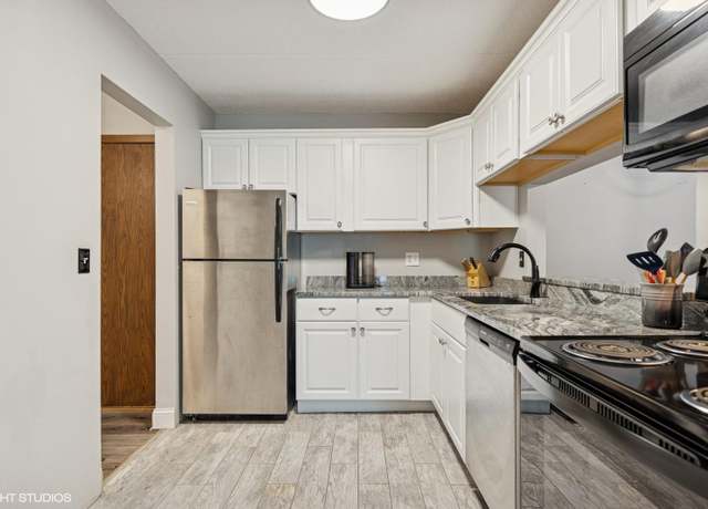 Property at 10401 Cedar Lake Rd #209, Minnetonka, MN 55305, 2 beds, 2 baths