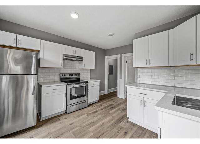 Property at 608 Beaumont St, Saint Paul, MN 55130, 4 beds, 2 baths