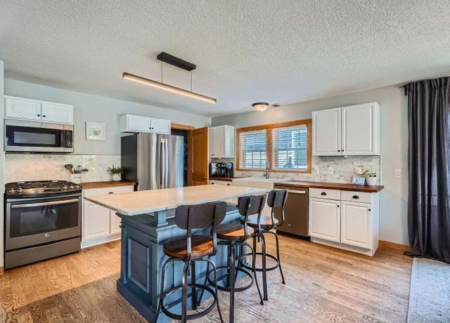Property at 8 Queen Ave S, Minneapolis, MN 55405, 4 beds, 2 baths