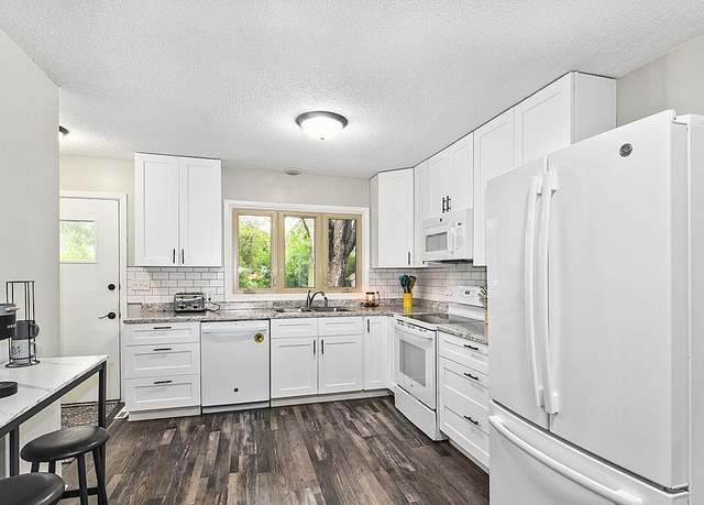 Property at 1032 23rd Ave N, Saint Cloud, MN 56303, 5 beds, 3 baths
