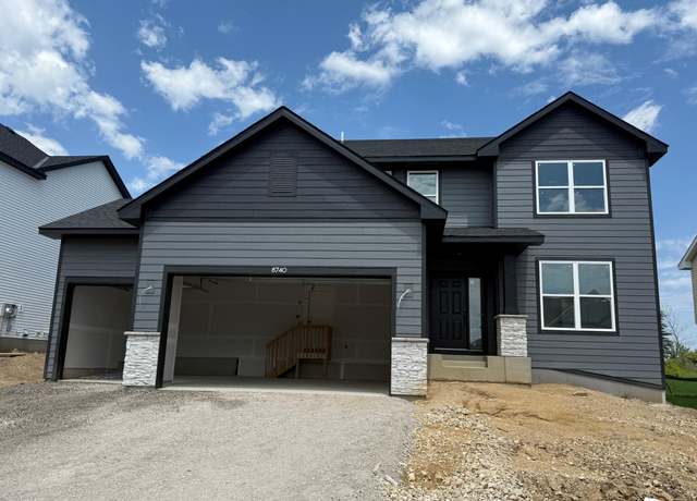 Property at 8740 Periwinkle Blvd, Woodbury, MN 55129, 5 beds, 3 baths
