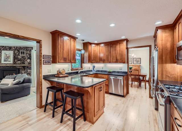 Property at 1917 29th Ave NW, New Brighton, MN 55112, 4 beds, 2 baths
