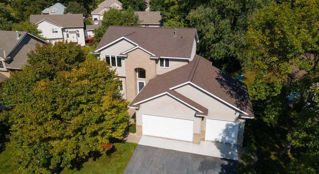 Photo of 10008 Hidden Oaks Ln N, Champlin, MN 55316