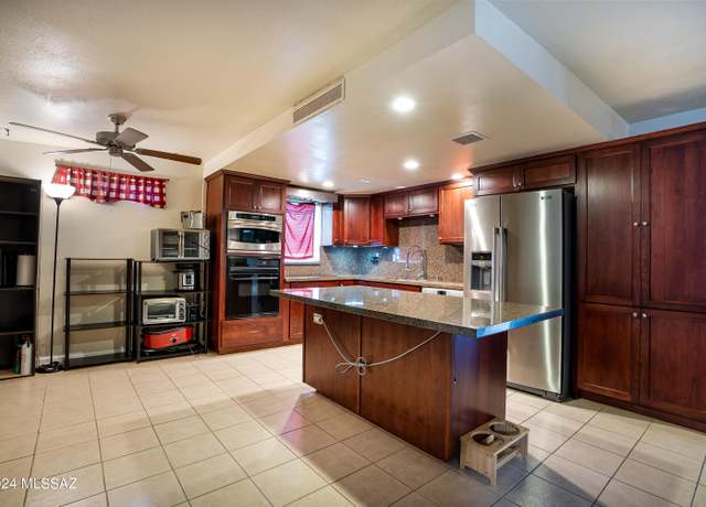 Property at 8133 E Holmes St, Tucson, AZ 85710, 3 beds, 2 baths