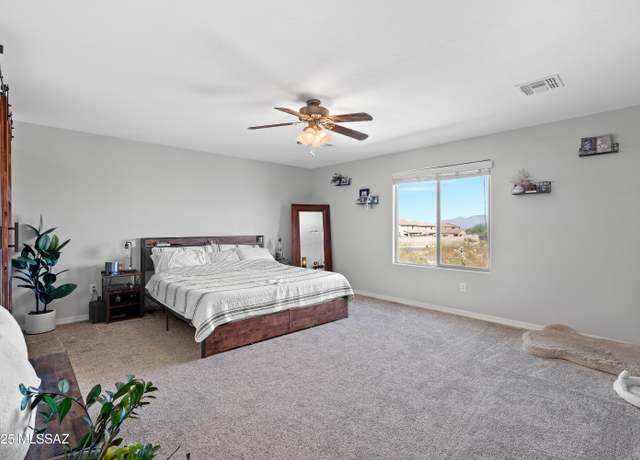 Property at 9509 S Quiet Dove Dr, Tucson, AZ 85747, 4 beds, 2.5 baths