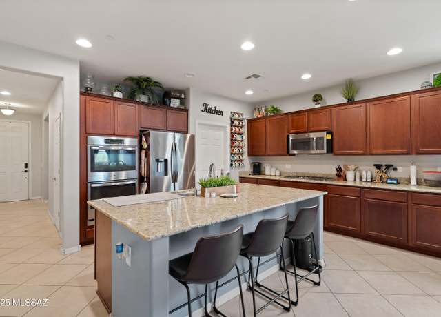 Property at 9509 S Quiet Dove Dr, Tucson, AZ 85747, 4 beds, 2.5 baths