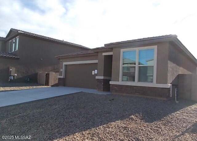 Property at 6704 E Via Arroyo Largo, Tucson, AZ 85756, 4 beds, 2 baths