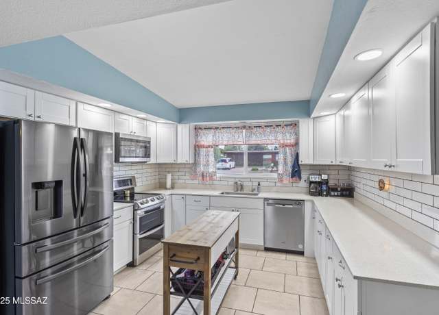 Property at 6951 E 1st St, Tucson, AZ 85710, 4 beds, 2 baths