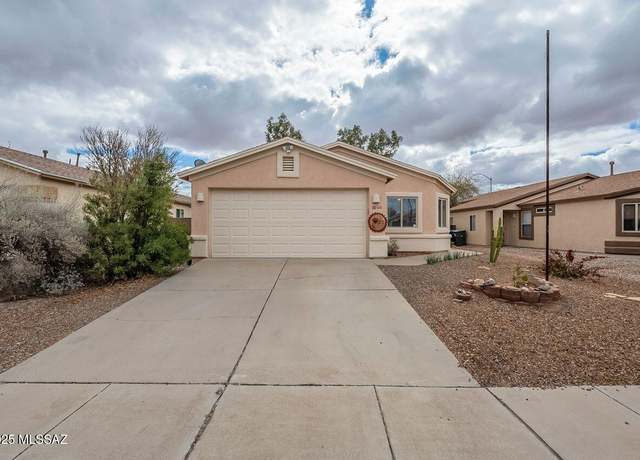 Property at 7695 S Meadow Spring Way, Tucson, AZ 85747, 4 beds, 2 baths