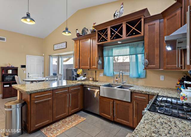 Property at 9704 E Paseo San Rosendo, Tucson, AZ 85747, 4 beds, 2 baths