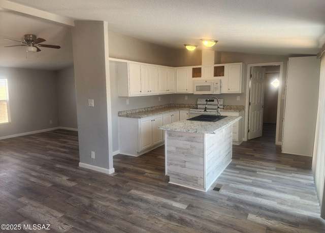 Property at 5828 N Chaparral Rd, Tucson, AZ 85743, 3 beds, 2 baths