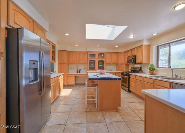 Property at 1402 N Camino Miraflores, Tucson, AZ 85745, 4 beds, 2 baths
