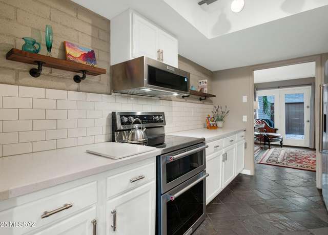 Property at 5701 E Glenn St, Tucson, AZ 85712, 3 beds, 2.5 baths
