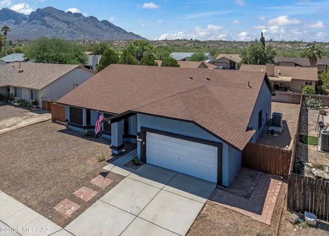 Property at 1517 W Oak Shadows Dr, Tucson, AZ 85737, 4 beds, 2 baths