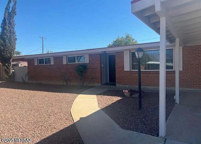 Property at 7122 E Eastland St, Tucson, AZ 85710, 4 beds, 2 baths