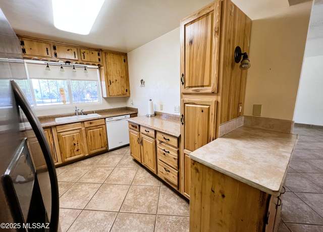 Property at 6071 E 27th St, Tucson, AZ 85711, 3 beds, 2 baths