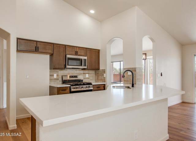 Property at 8959 N Soft Winds Dr, Tucson, AZ 85742, 4 beds, 2 baths
