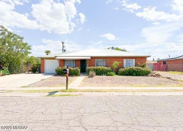 Property at 4874 E 12th St, Tucson, AZ 85711, 3 beds, 2 baths