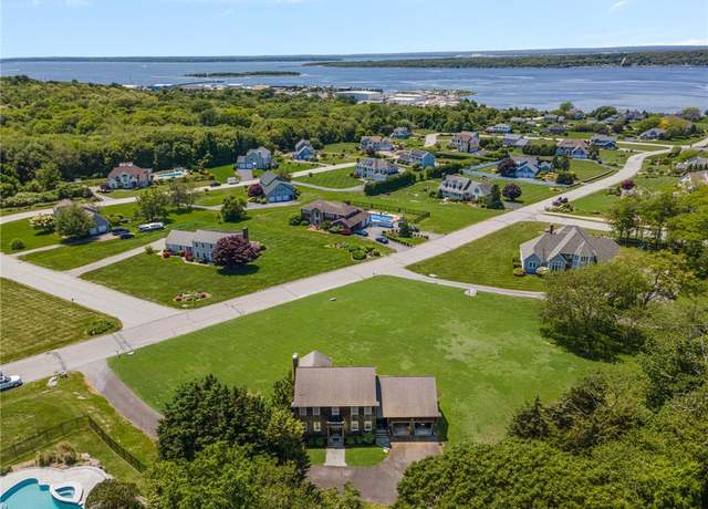 Property at 121 King Charles Dr, Portsmouth, RI 02871, 4 beds, 2.5 baths