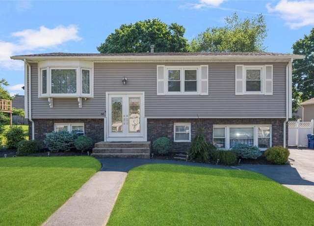 Property at 66 North Palm Blvd N, Warwick, RI 02888, 4 beds, 2.5 baths