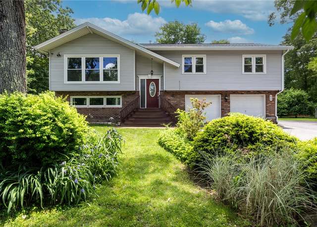 Property at 64 Higgins Dr, South Kingstown, RI 02881, 4 beds, 3 baths