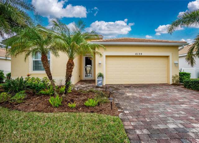 Property at 6139 Grand Cypress Blvd, North Port, FL 34287, 4 beds, 3 baths