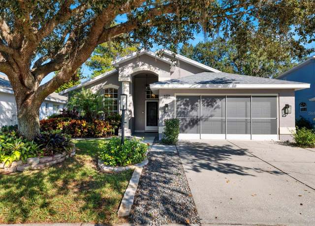 Property at 11423 Tee Time Cir, New Port Richey, FL 34654, 3 beds, 2 baths