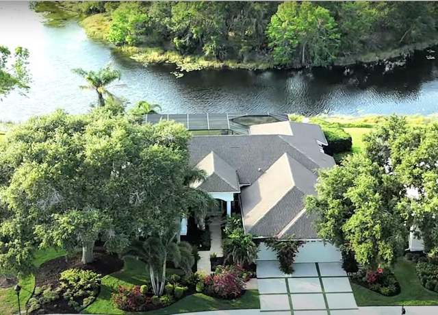 Property at 8687 Woodbriar Dr, Sarasota, FL 34238, 3 beds, 4 baths