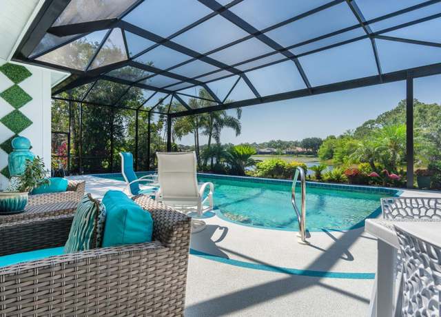 Property at 8687 Woodbriar Dr, Sarasota, FL 34238, 3 beds, 4 baths