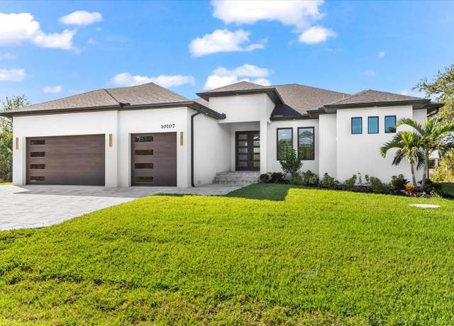 Property at 10107 Boylston St, Port Charlotte, FL 33981, 4 beds, 3.5 baths