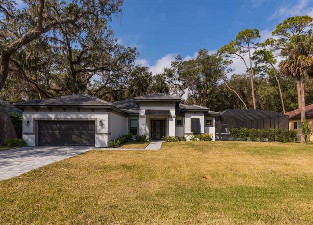 Property at 15 River Oaks Way, Palm Coast, FL 32137, 4 beds, 2 baths