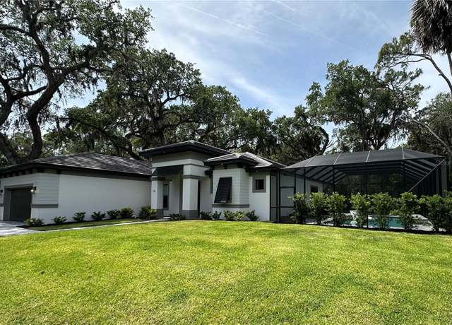 Property at 15 River Oaks Way, Palm Coast, FL 32137, 4 beds, 2 baths