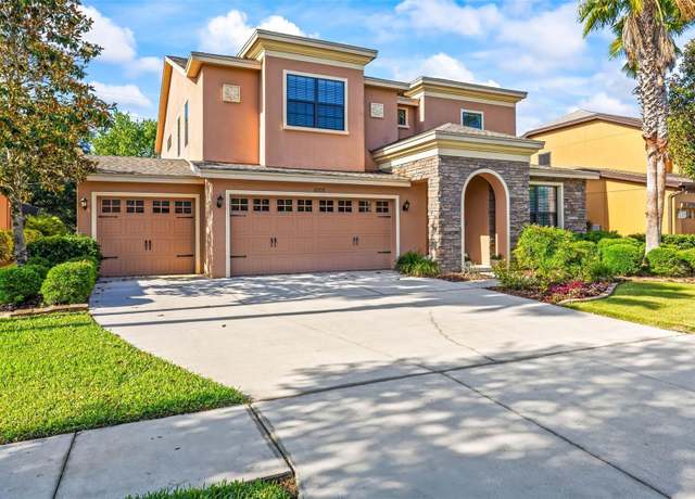 Property at 32718 Summerglade Dr, Wesley Chapel, FL 33545, 5 beds, 3 baths