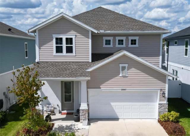 Property at 28847 Orange Berry Dr, Wesley Chapel, FL 33543, 4 beds, 3.5 baths