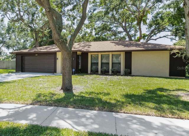 Property at 2480 Treemont Way, Dunedin, FL 34698, 4 beds, 2 baths