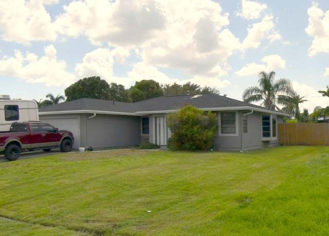 Property at 382 NE Genesee Ave NE, Port St Lucie, FL 34983, 3 beds, 2 baths