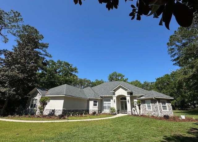 Property at 10614 SW 15th Ln, Gainesville, FL 32607, 4 beds, 4.5 baths