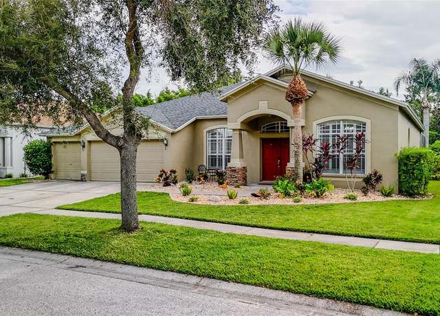 Property at 16211 Bridgepark Dr, Lithia, FL 33547, 5 beds, 3 baths