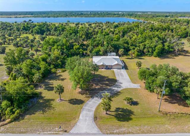Property at 27455 Jones Loop Rd, Punta Gorda, FL 33982, 4 beds, 3 baths
