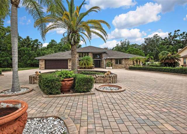 Property at 5747 Fieldspring Ave, New Port Richey, FL 34655, 4 beds, 3.5 baths